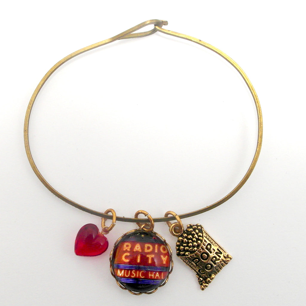 Radio City, Popcorn Bag and "I love it" Red Bead Charm Bracelet